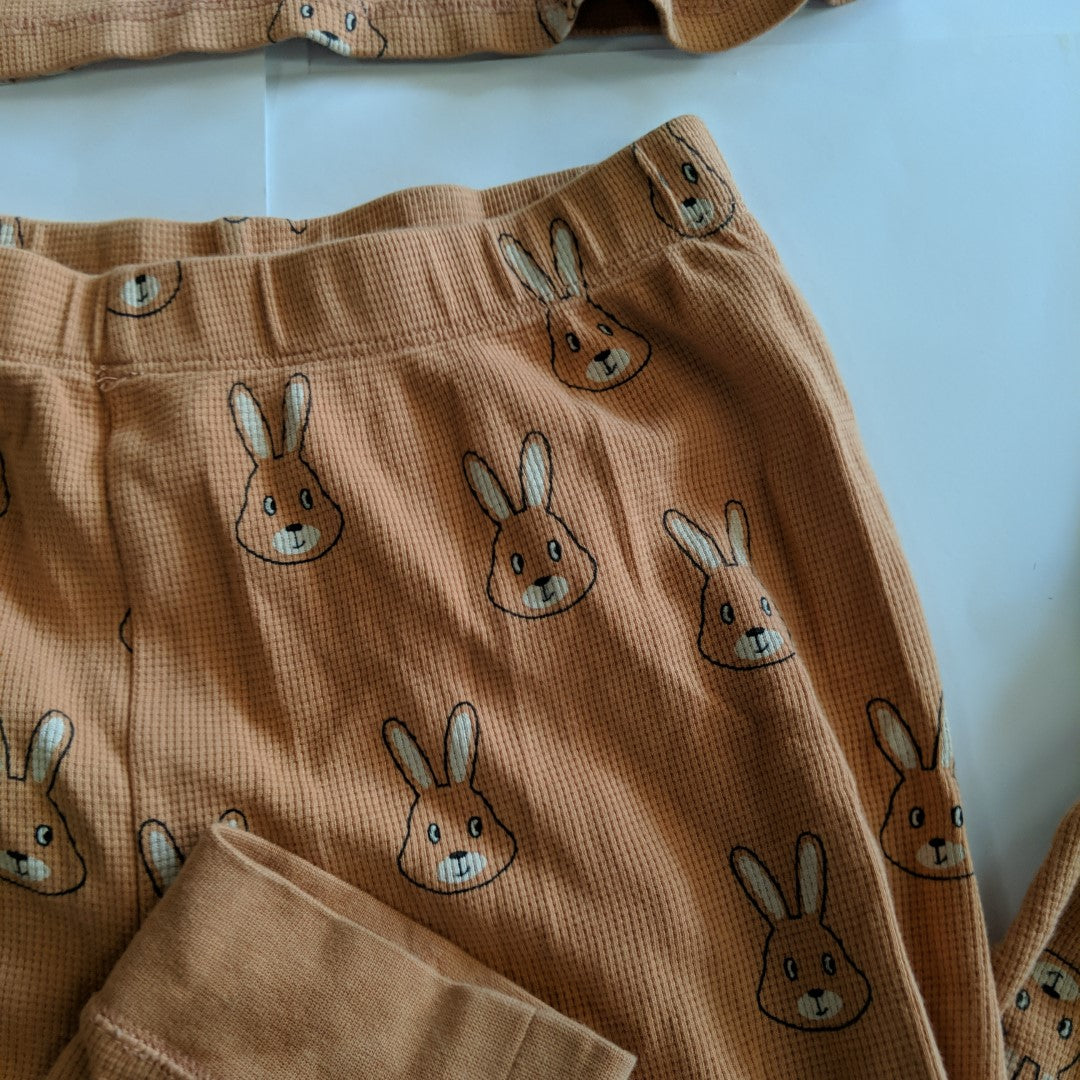 Brown rabbit pyjamas - size 10