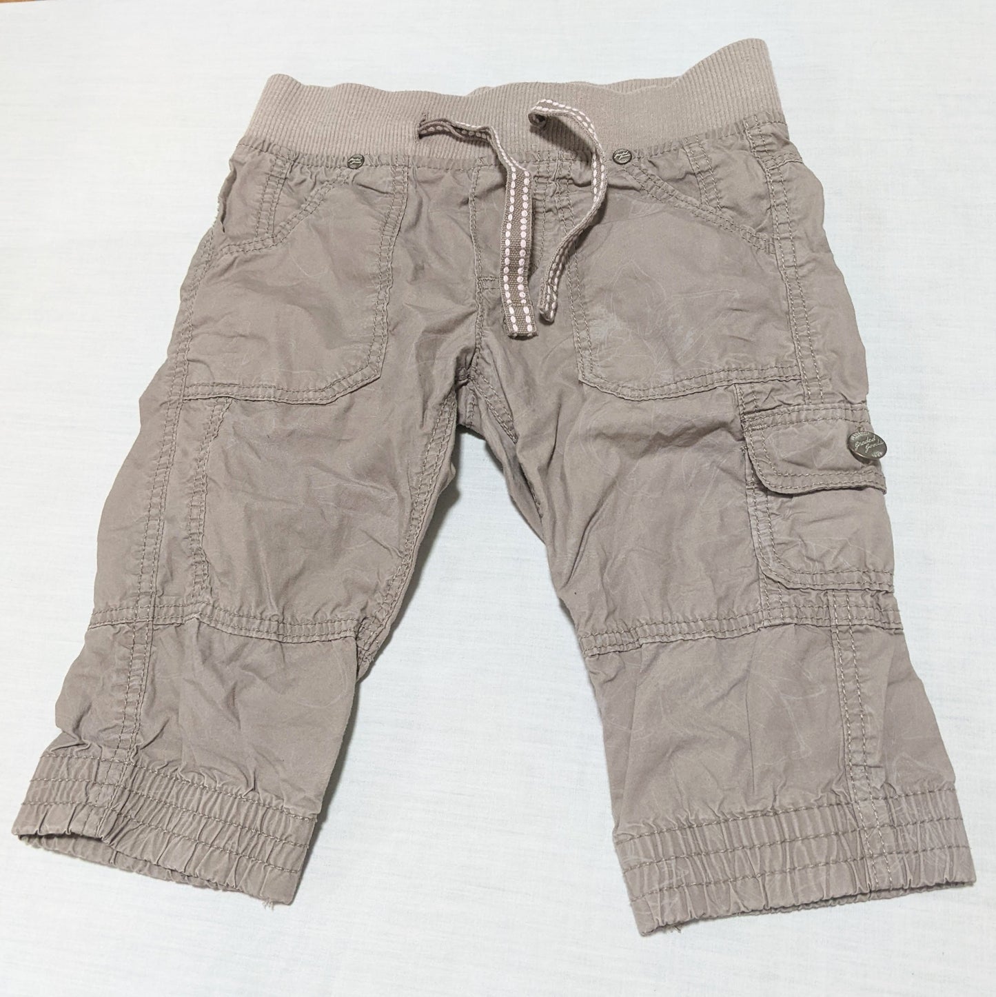 Brown cargo pants with faint flower pattern - size 3