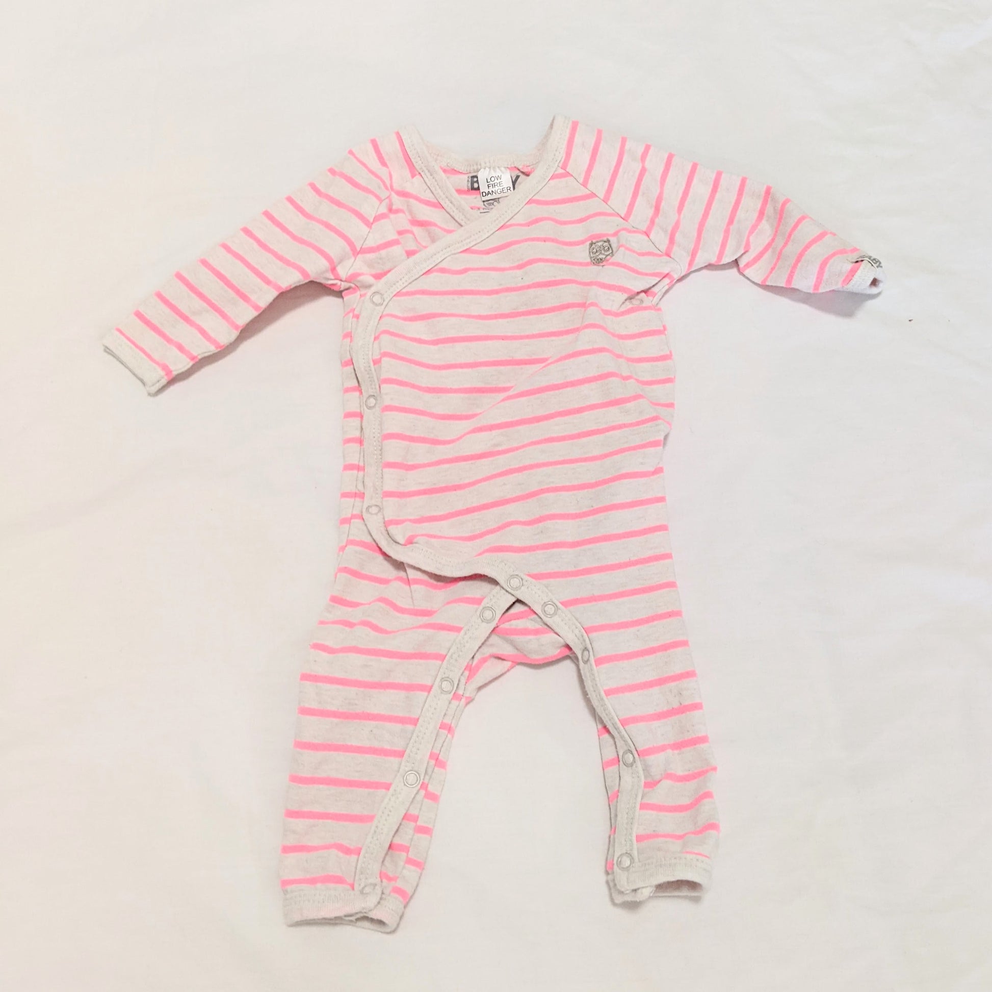 Fluro pink stripey onesie - size 000