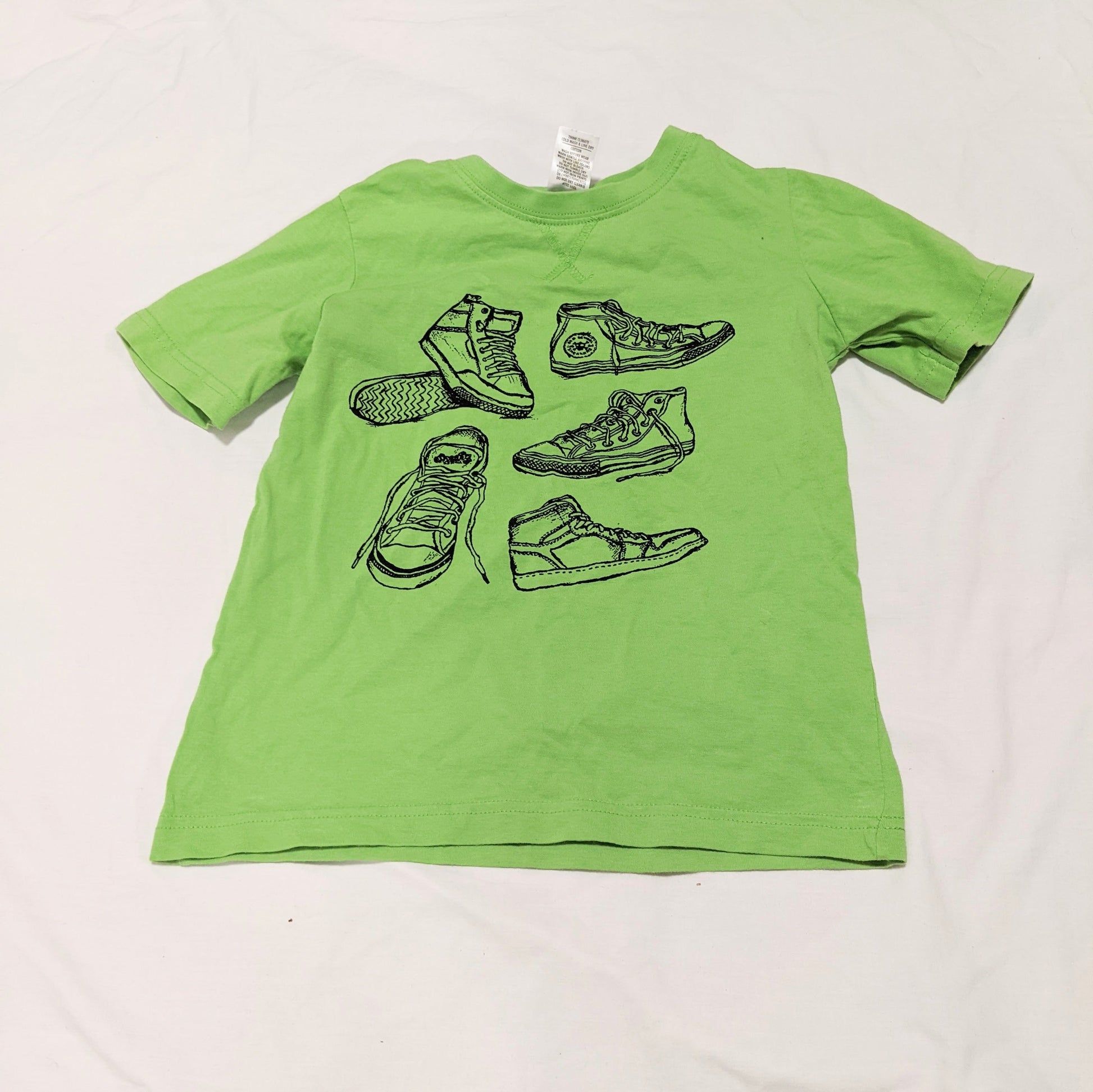 Green T-shirt with shoe design - size 5