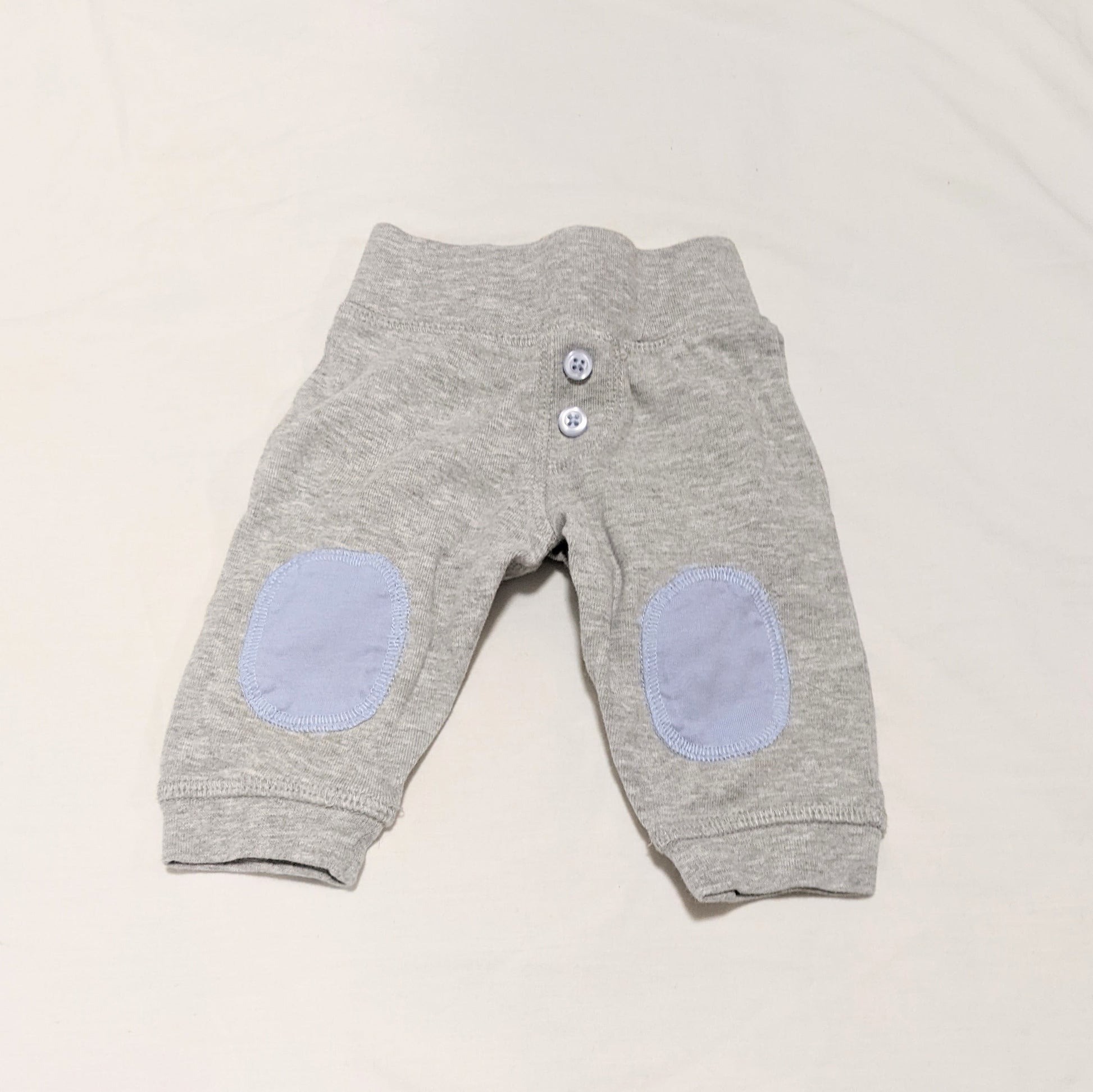 Grey pants with blue knee patches - size 000