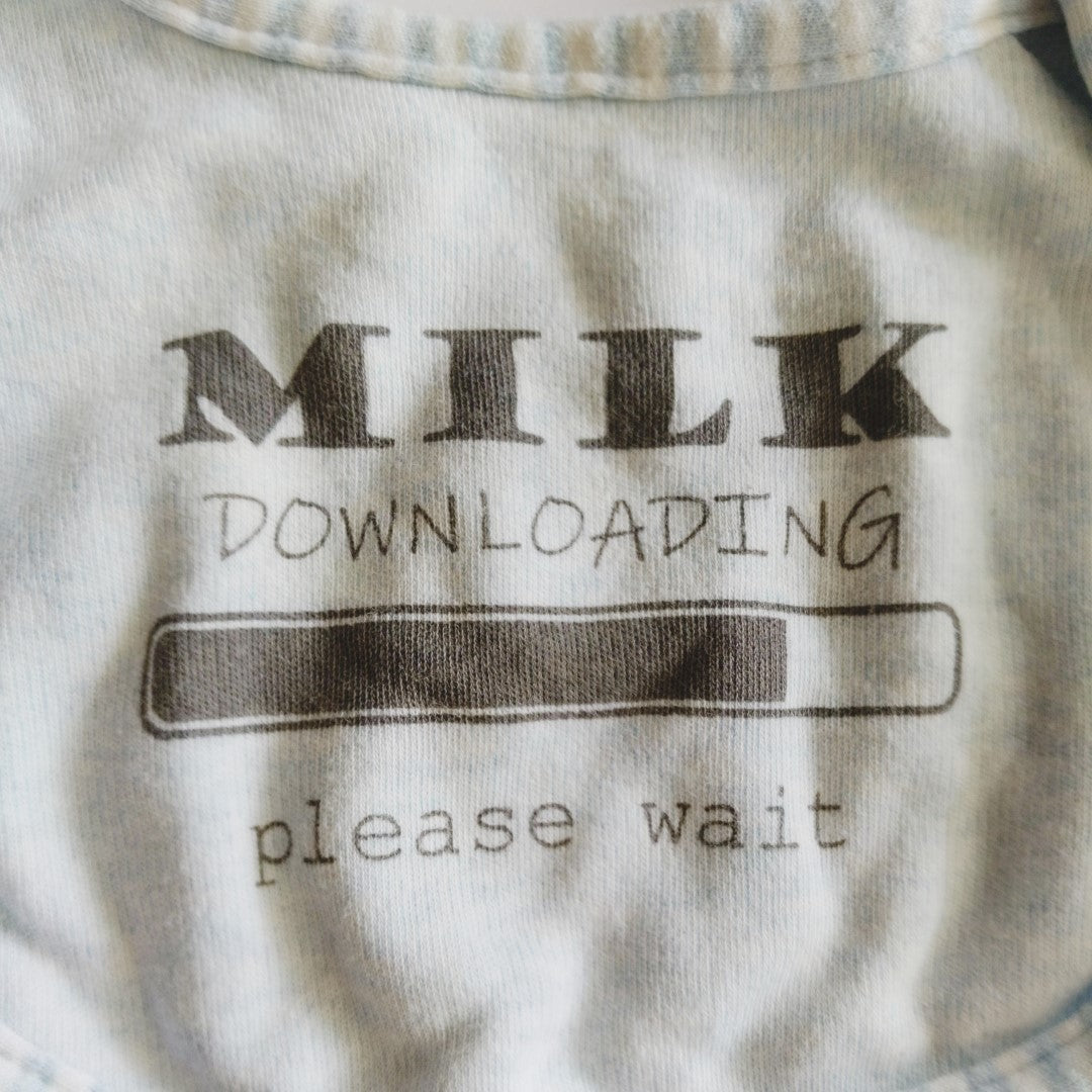 Milk downloading bib - size 000